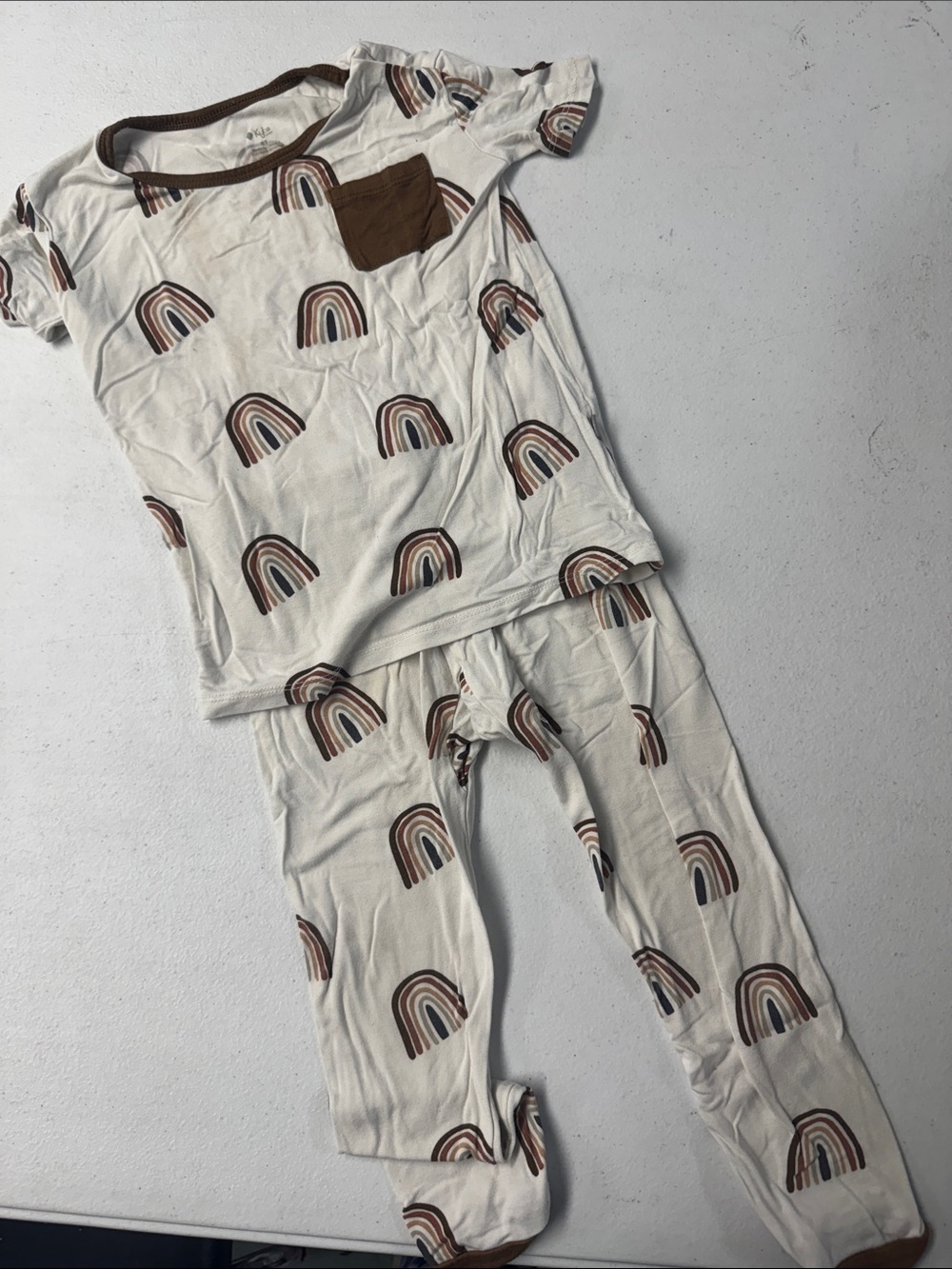 Kyte BABY Cream Pajama Set with Brown Rainbow Print